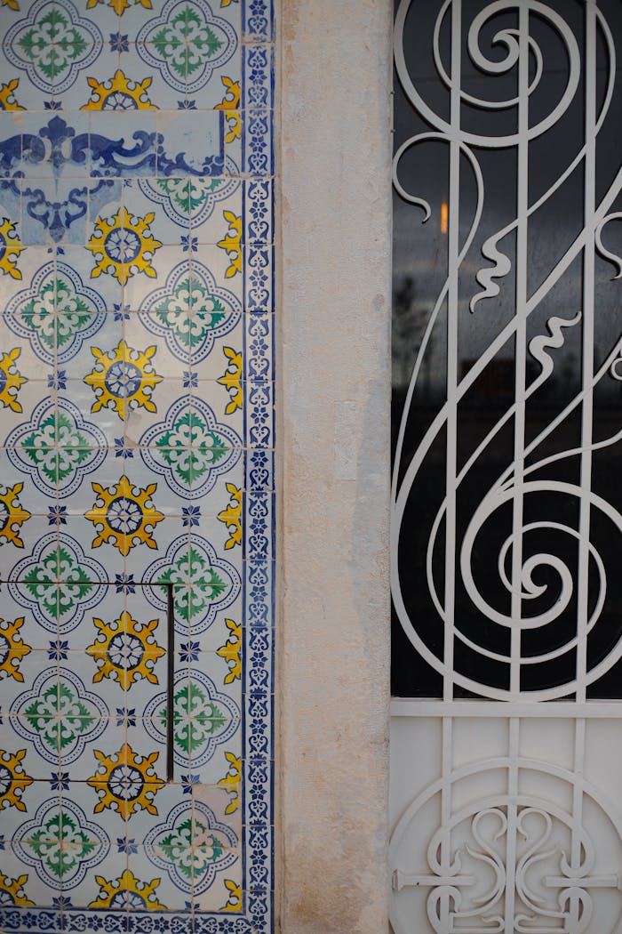 our-story-01 colorful-azulejo-tiles-and-ornate-ironwork-door-34930563